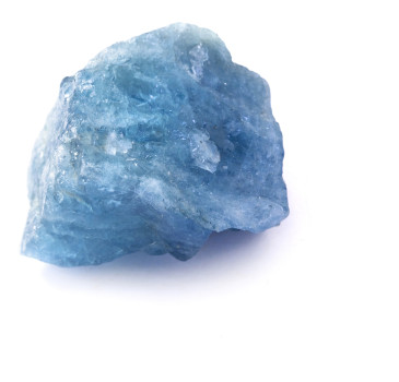 A blue aquamarine crystal isolated on a white background. 