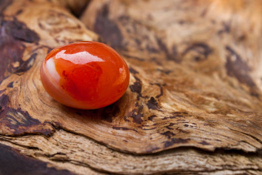 An orange carnelian stone with magical and metaphysical properties.