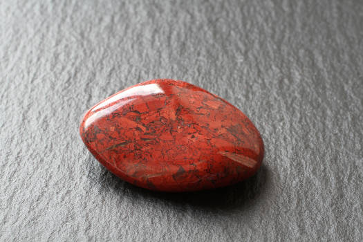 A red jasper gemstone with magical and metaphysical properties. 