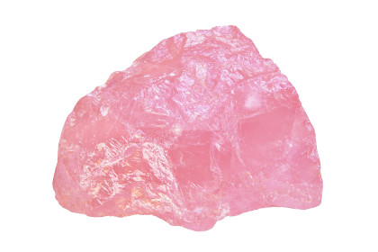 A pink rose quartz crystal isolated on a white background. 