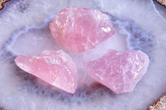 Pink rose quartz crystals with magical and metaphysical properties. 