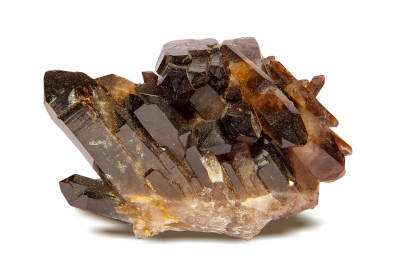 A smoky quartz crystal isolated on a white background. 