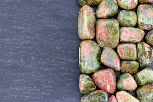 A bunch of unakite gemstones with magical and metaphysical properties. 