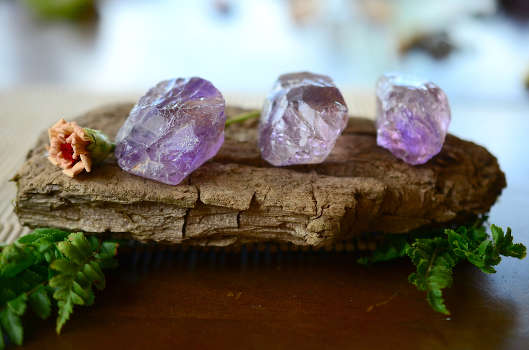 Three ametrine crystals with magical and metaphysical properties. 