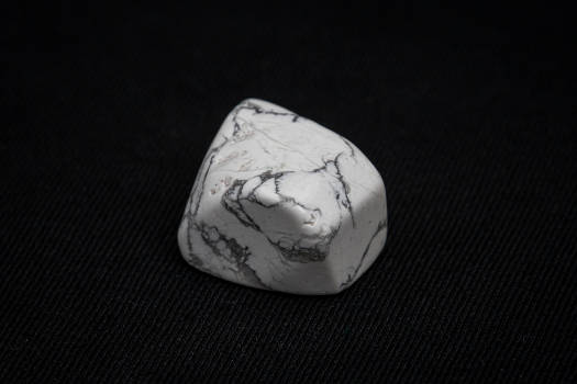 A white howlite stone with magical and metaphysical properties. 