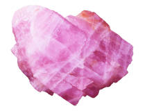 A pink calcite crystal isolated on a white background. 