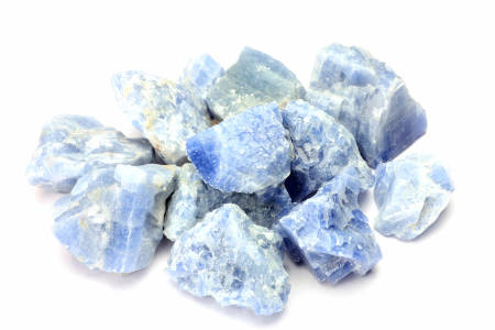 Blue calcite crystals isolated on a white background. 