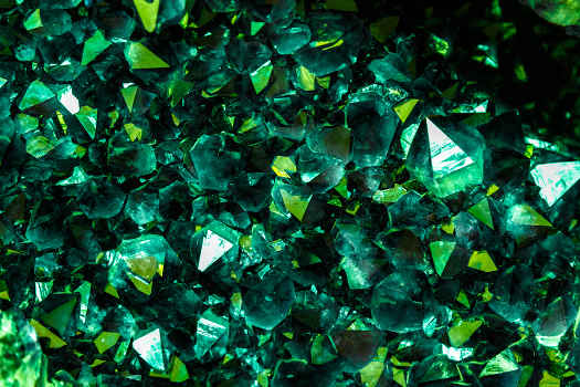 A macro shot of emeralds with magical and metaphysical properties. 