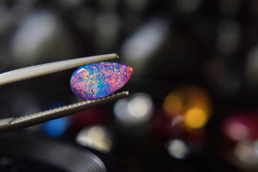 A colorful opal with magical and metaphysical properties. 