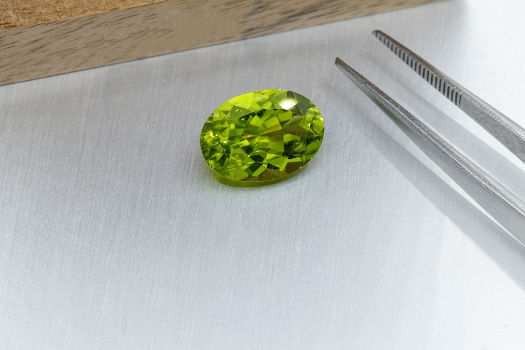 A green peridot crystal with magical and metaphysical properties. 